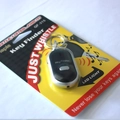 Black electronic key finder with silver trim and LED light in yellow blister packaging - Black (Card Package)