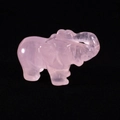 Pink quartz crystal elephant statue with smooth hand-carved finish on black background - Rose Quartz