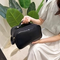 Portable black large-capacity makeup bag in PU leather with double zipper and top handle - Black