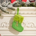 Green knitted Christmas stocking with plush cuff and gold glitter letter A detail - Letter A