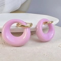Detailed close-up of pink oval hoop earrings with gold metal clasp on stone tray - Gold-Purple