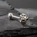 Polished stainless steel skull tongue ring with 1.04cm height and 0.73cm width dimensions - Finely Carved Skull (S253)