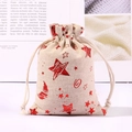 Christmas burlap gift bag with red foil stars and moon pattern and drawstring closure - Red Stars Moon