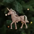Rose gold glitter unicorn Christmas tree ornament 12cm with festive bokeh background - Unicorn Design