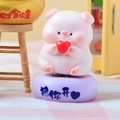 Cute pink pig figurine holding a red heart on a purple base for desk decoration - A181 Happy Pig