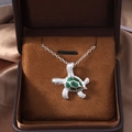 Silver sea turtle pendant necklace with sparkling green opal inlay on dark brown silk - Large Green Sea Turtle