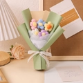 Hand-knitted bouquet with 5 colorful flowers in pink, blue, yellow, and purple wrap - Green