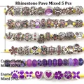 Macro view of silver alloy beads with purple crystals and patterned glass charms - Purple Series - 40Pcs