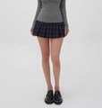 Detailed view of dark blue plaid pleated mini skirt with knit sweater and loafers - XS / Navy Blue