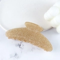 Glittery gold acrylic hair claw clip with a glossy finish for elegant hairstyling - Gold