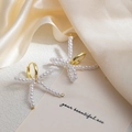 Elegant gold earrings featuring a cream pearl bow design on textured satin fabric - E3742-3-3D Pearl Bow Huggie Hoop