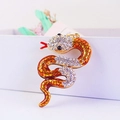 Golden snake keychain with orange enamel and sparkling crystals for women's handbag - Gold