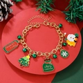 Detailed overhead shot of Christmas charm bracelet with Santa, tree, and snowflake pendants - D1238 (Lucky Bag Christmas Gift)