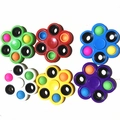 Set of six colorful plastic fidget spinners with multi-colored balls on white background - New Fidget Spinner with Pop Bubbles