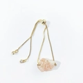 Detail of adjustable gold bracelet with irregular raw natural crystal and slider clasp - Sunstone