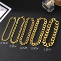 Golden stainless steel Cuban link chains in five different widths from 3mm to 11mm - Width 0.3cm / Gold