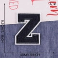 Navy blue chenille letter Z embroidery patch with white border measuring 5.5x4cm - Letter Z / Navy Blue