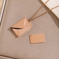 Rose gold envelope pendant necklace with removable metal card on silk background - Plain Envelope / Rose Gold