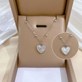 Silver titanium heart necklace with reversible sunburst and white shell inlay design - N213 Shell Double-sided Heart Silver