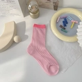 Pink crew socks with contrast cuff and openwork knit texture on a clean background - All Pink