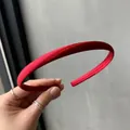 Slim candy-colored red satin headband featuring a fine woven texture and silky finish - Burgundy