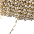 DIY jewelry making accessory featuring white round pearls on a golden alloy chain link - 5 mm / Gold