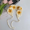 Handmade white crochet headband featuring bright yellow sunflower patterns and ties - Beige Sunflower
