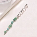 Detailed view of silver spiral hair coil with natural green stone charm for dreadlocks - Silver Base Dark Green Long