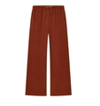 Detail of dark orange wide-leg sweatpants featuring elastic drawstring waistband - XS / Bottoms / Red