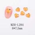 Detail of amber heart nail art charms with gold metal edges and sizing information - L284-Amber Heart with Gold Border