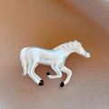Detailed close-up of a vintage horse brooch with white pearl luster and black accents - 84# Silver - Black