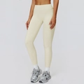 Hoch taillierte Thermo-Yoga-Leggings in Cremeweiß aus mattem, elastischem Kompressionsstoff - S / Cremefarbene Aprikose