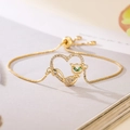 Gold-plated cat heart bracelet with green gemstones and adjustable box chain - Gold Hollow Heart Cat