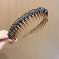 Detail of non-slip headband with dark gray rhinestones and brown teeth comb for secure grip - Coffee