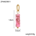 Detailed view of pink textured cylindrical beads with gold metal loop jewelry charms - Pink
