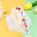 Polyester ribbon roll with colorful balloon prints on a white base for gift wrapping - Balloon
