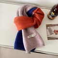 Detail of soft knitted scarf with pink, orange, and blue color-blocking and FEIDE label - 150*20cm / Orange Blue Pink