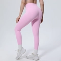 Detailansicht der rosa High-Waist-Leggings mit Fokus auf den Push-up-Effekt am Gesäß - S / Kirschblütenrosa