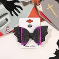 Detail of purple and black sequin bat wing bow hair clip for Halloween costumes - Bowtie Bat Wing Hair Clip