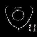 Silver luxury jewelry set with lightning bolt charms and sparkling crystals on black - 425 Clip-on Earrings Three-piece Set