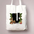 White canvas tote bag featuring Christmas themed letter U with reindeer and holiday ornaments - Letter U