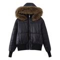 Detail of black winter jacket featuring fluffy brown faux fur collar and ribbed windproof cuffs - S / Black