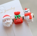 Detail of Christmas resin hair clips featuring Santa and bear figures on a card - Style 15 Christmas Hair Clip