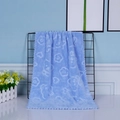 Blue coral fleece face towel featuring white bear and flower patterns with wavy edges - Sky Blue