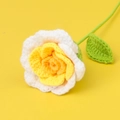Macro detail of handmade crochet rose with white petals and a yellow center on a yellow background - New Yimian Thread Thai Rose Bouquet - Gradient Yellow
