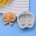 Detail showing skull with wings mold and finished resin tag for Halloween DIY - Winged Skull Crossbones Style (2)