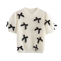 Pull en maille blanc à manches courtes avec nœuds noirs et manches bouffantes - Blanc
