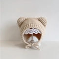 Baby Wintermütze in Haferfarbe mit Bärenohren und Bindebändern für warme Ohren - 3M-2J / Beige