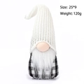 Detail of Christmas gnome plush with white knitted hat and black-white plaid body - White