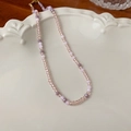 Pastel crystal beaded necklace with pink and lilac faceted stones in a white ceramic tray - 50# Necklace-Pink-Cylindrical